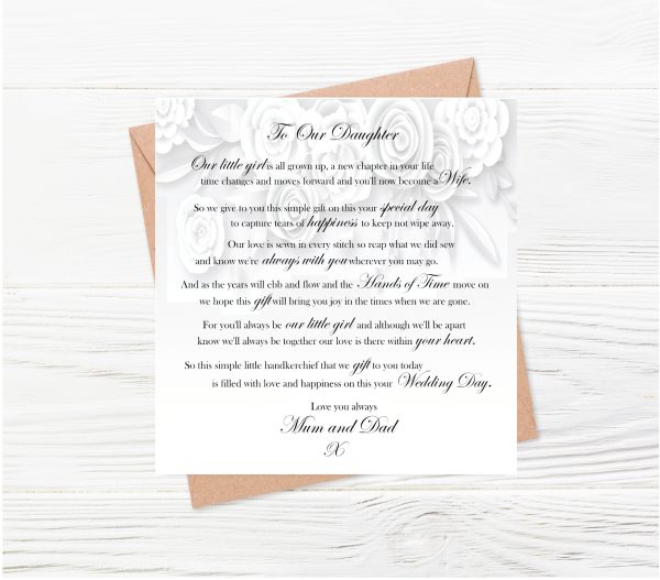 card with verse and brown envelope on wooden background