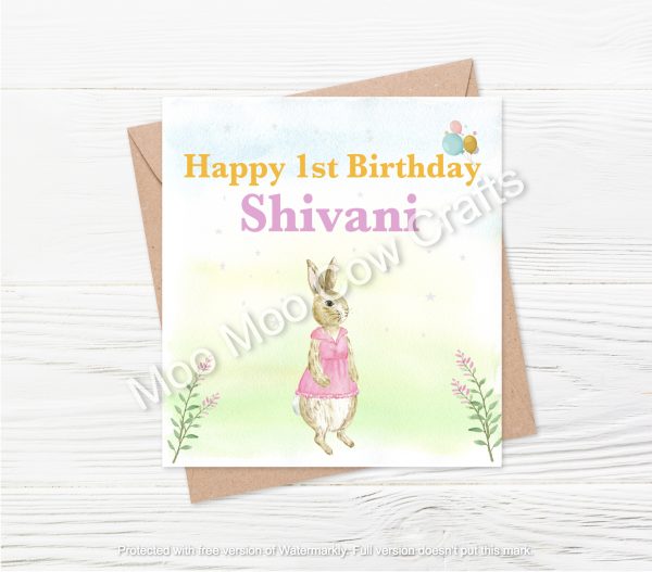 rabbit on green background with balloons