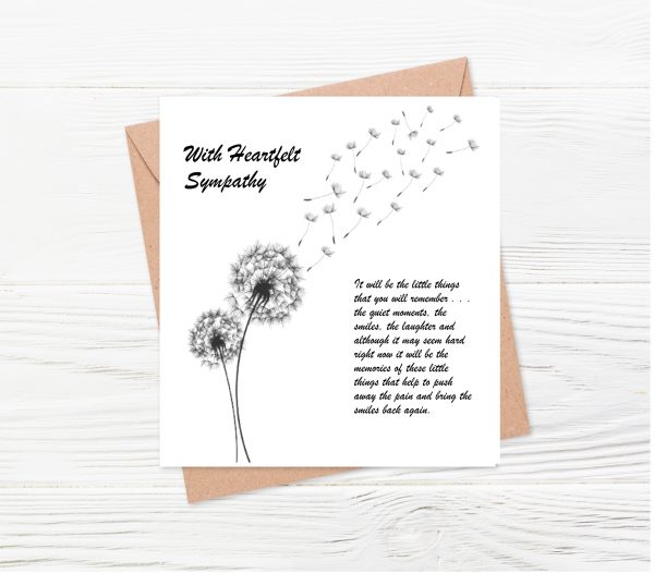 text and dandelion on white card