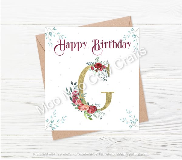 letter g with flowers and text
