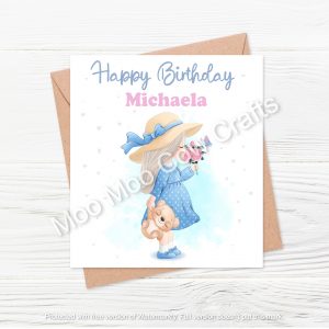 little girl smelling flowers on white background