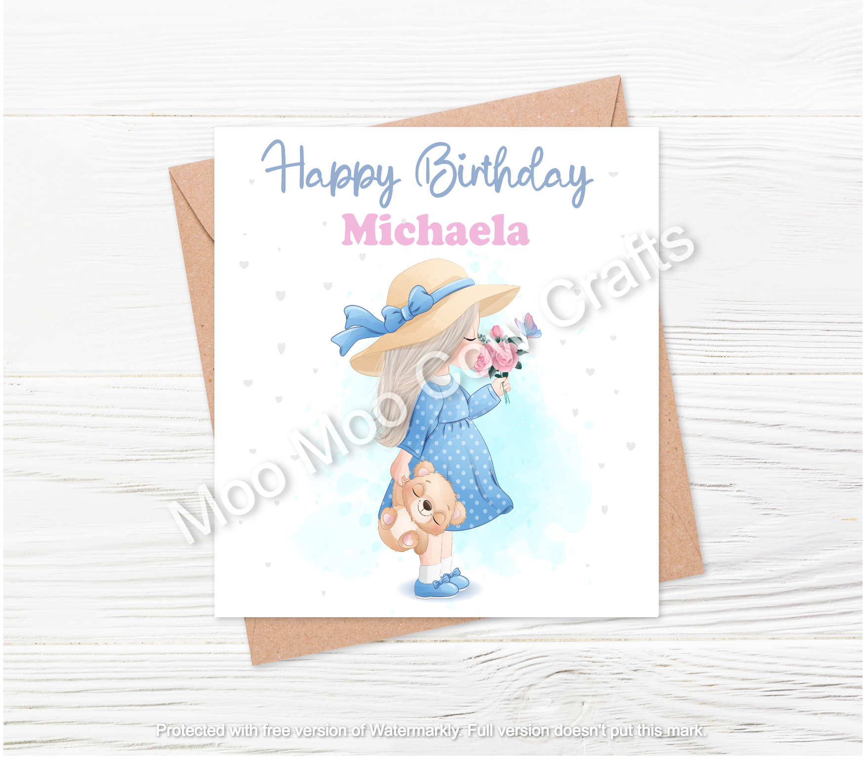 little girl smelling flowers on white background