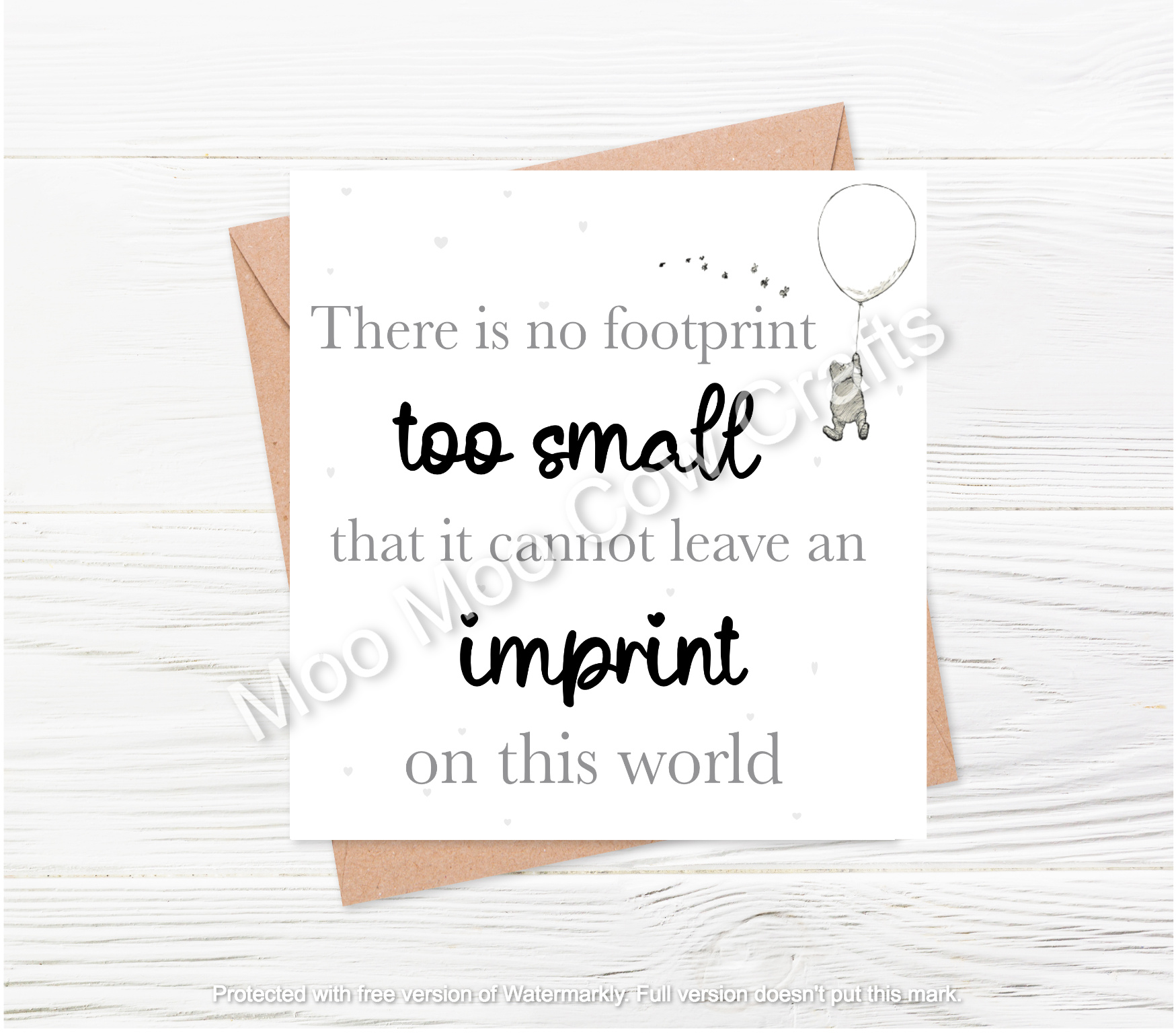 Text on white background with brown card and wooden background