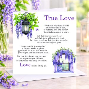 wisteria in a vase and a card sitting on a shelf with a wisteria design - it's a sympathy card
