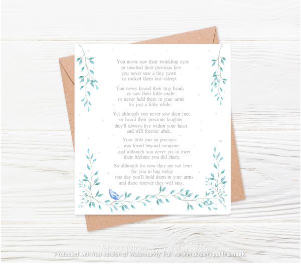 text on white card with brown envelope and wooden background