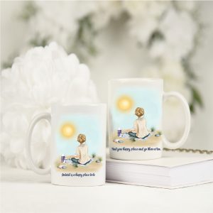 two mugs with white flowers and white book
