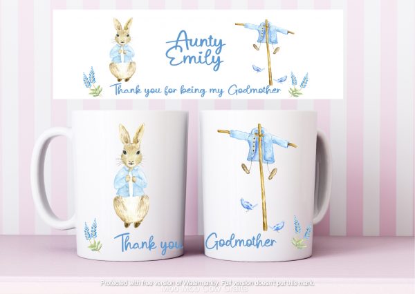 two mugs with rabbit design on pink stripe background