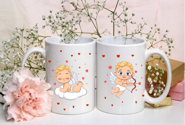 white cups with cupid, pink flower and white flower