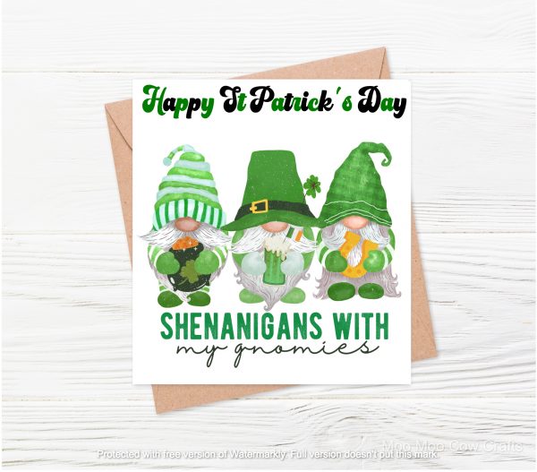 three green gnomes on a card