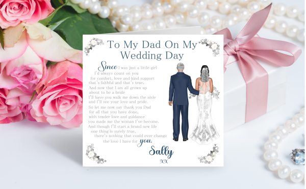 two figures on white card with flowers and pearls in background