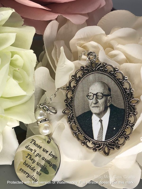 pendant with picture and tag with engraving on a flower background