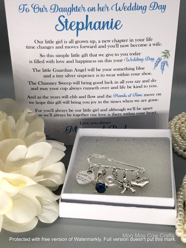 charms and card with pearls and a flower