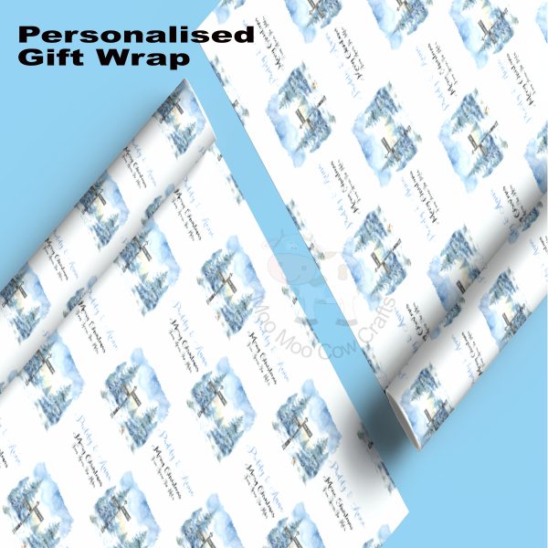 blue background with white rolls of wrapping paper with snowy blue image