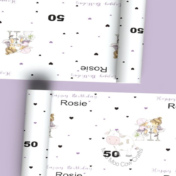 purple background with two rolls of wrapping paper