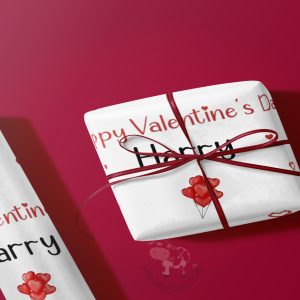 white gift box with valentine wrapping on red background