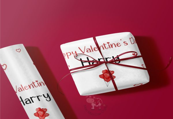 white gift box with valentine wrapping on red background