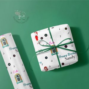 gift box and wrapping on green background