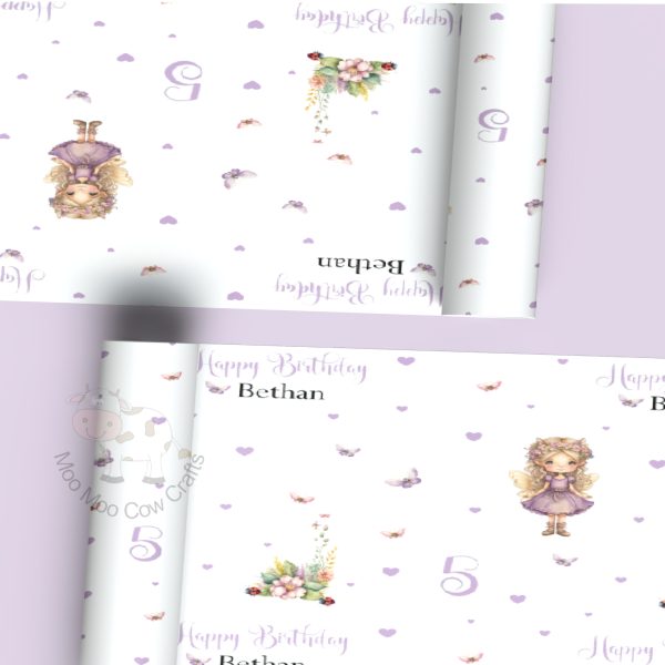 2 rolls of wrapping paper with purple