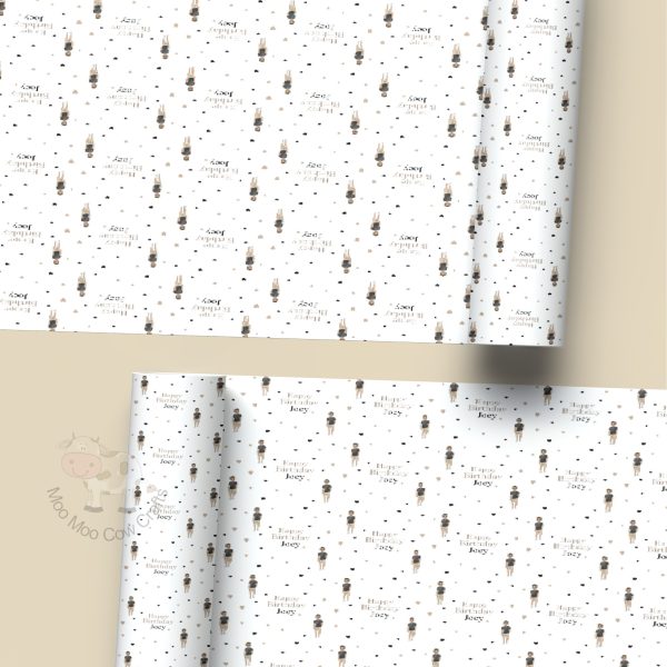 two rolls of wrapping paper with a taupe background