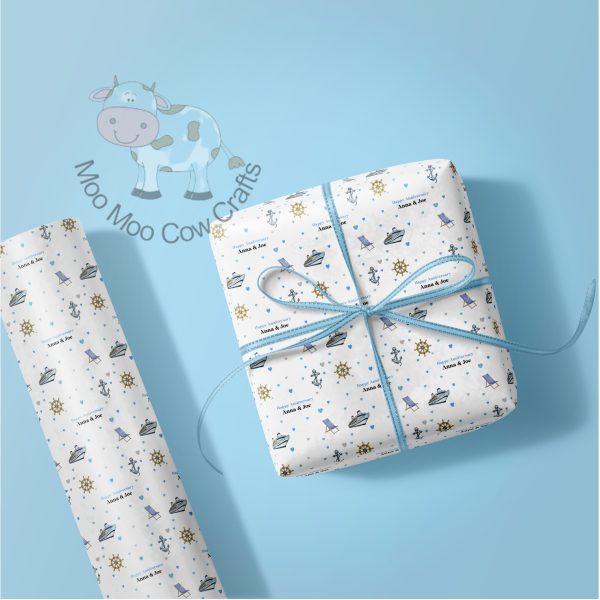 blue background with gift box and roll of wrapping paper with a ship, anchor and a blue ribbon.
