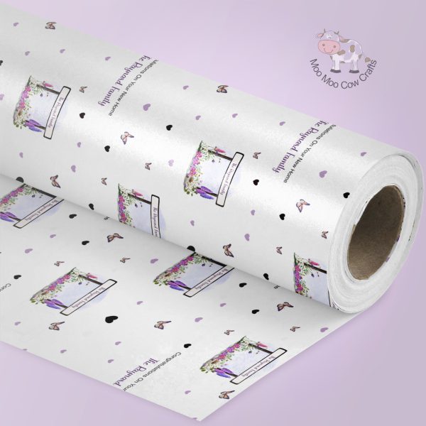 purple background roll of wrapping paper with purple clipart images of street sign and butterflies