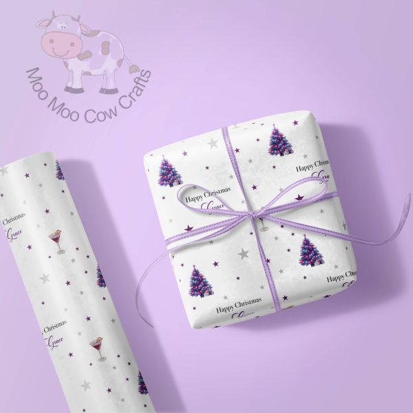 lilac background with a roll of paper and a gift box.