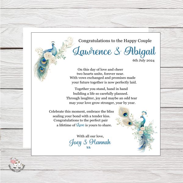 wooden background with a peacock design wedding card