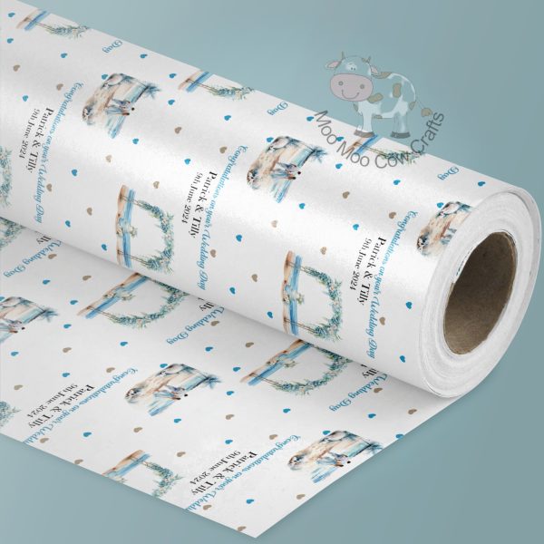 blue background with roll of wrapping paper with blue wedding repeating pattern.