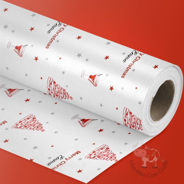 red background with a roll of xmas wrap with a pattern of a red xmas tree