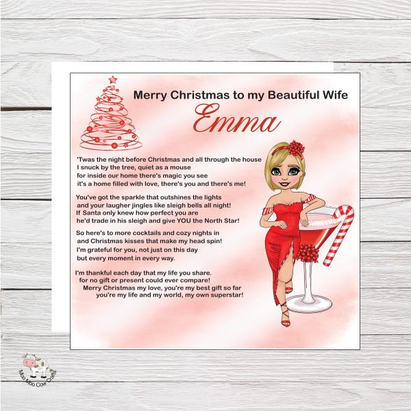wooden background with clip art image of woman leaning in a candy cane cocktail glass, it's a Xmas card
