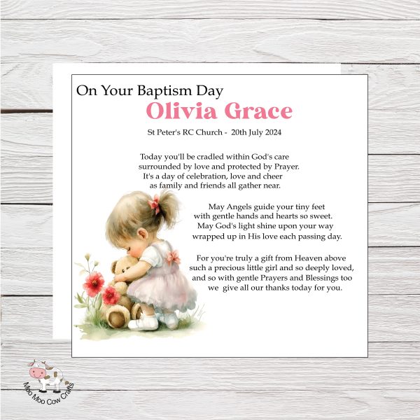 wooden background with a card on top with a clipart little toddler girl and text, it's a christening congratulations card