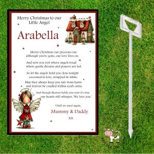 grass background with a card holder, clip art images of a little angel and a gingerbread house - it's a xmas card