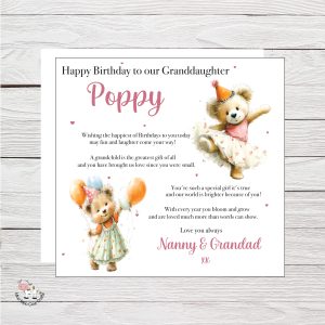 wooden background with two clip art dancing bears - it's a birthday card