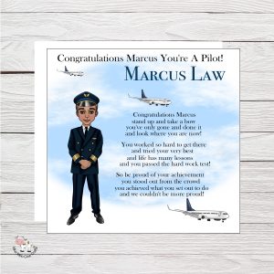 wooden background with clip art image of a pilot and black text - it's a congrtulations card