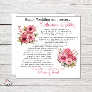 wooden background with clip arty images of gerberas and black text - it's an anniversary card