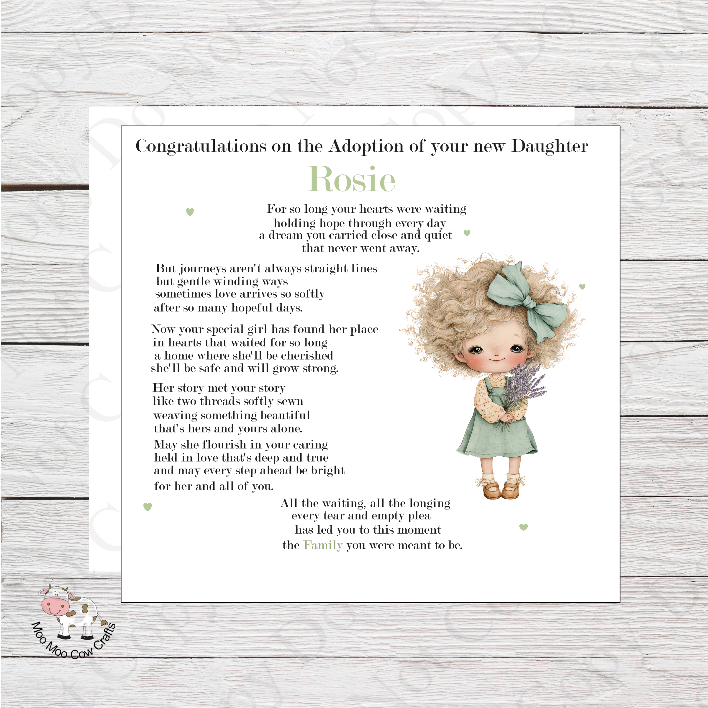 wooden background with white card, clip art image of a little girl and black text - it's a congratulations card for adoption of a little girl