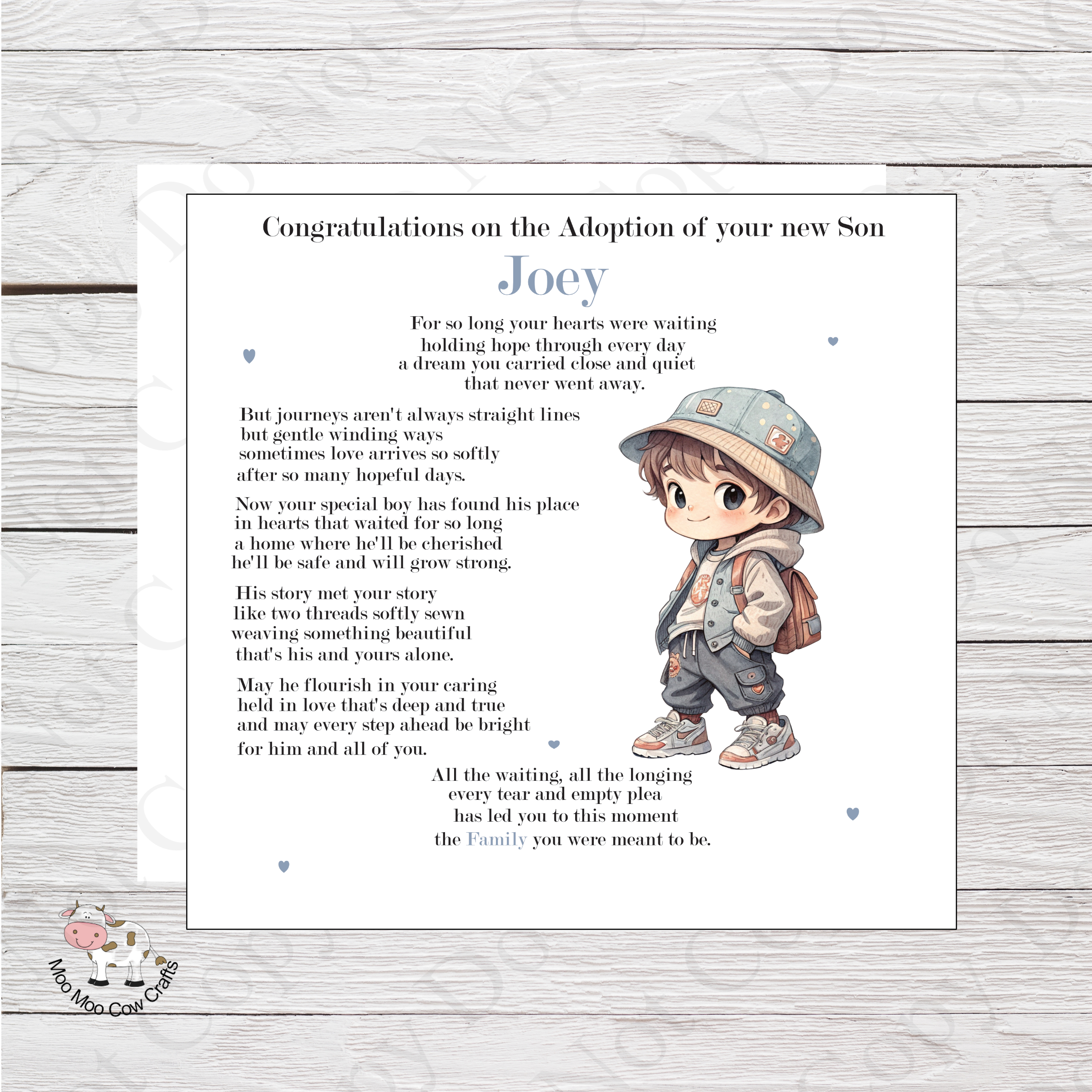 wooden background with clip art image of a little boy and black text - it's a congratulations on adoption card