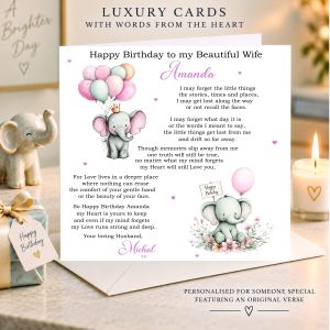 Personalised dementia birthday card for a wife from her husband, with elephant illustrations, displayed with a birthday gift and candle.