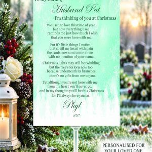 Personalised Christmas graveside memorial card for a late husband, featuring an original remembrance verse, displayed at a snowy graveside with white flowers and lantern. ❤️
