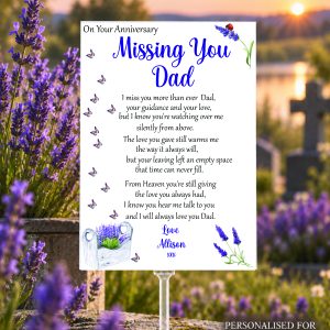 Personalised Missing You Dad memorial grave card with original verse, displayed in a clear graveside holder among lavender flowers.